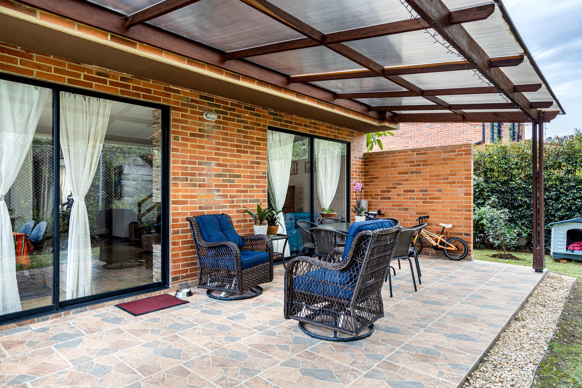 Covered patio outdoor living space with seating